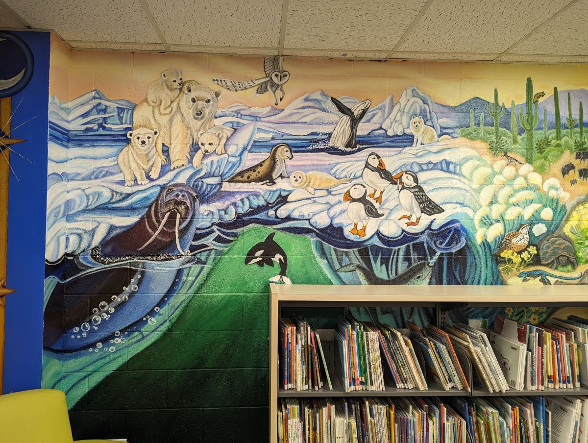 Colorful mural depicting animals in arctic ecosystem