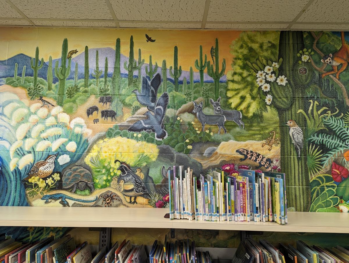 Colorful mural depicting animals in desert ecosystem