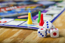 Board game and board pieces on top of table